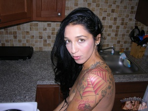 Tattooed Amateur Girl with Dermal Piercings